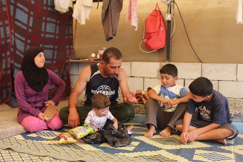 Abo Abdo with his wife and three sons