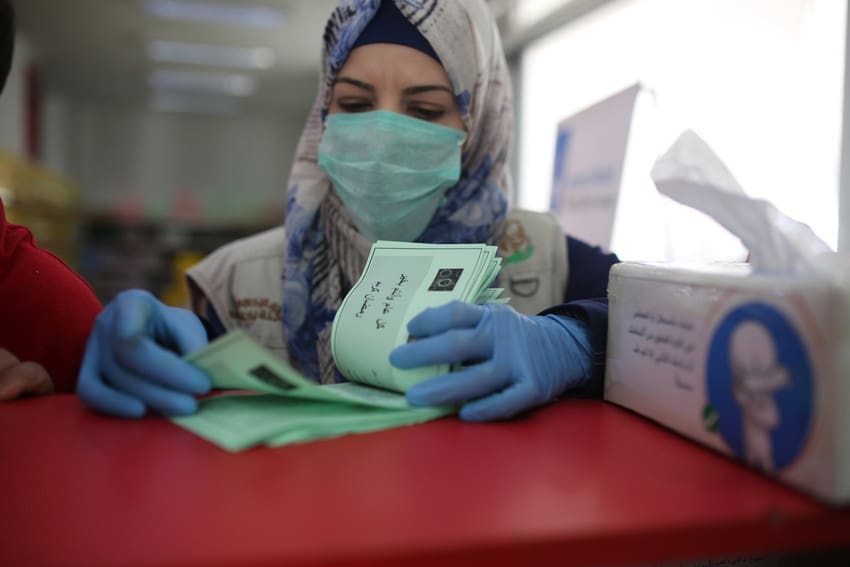 Our team preparing food vouchers in the Gaza strip.